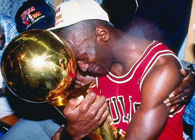 Jordan holding trophy